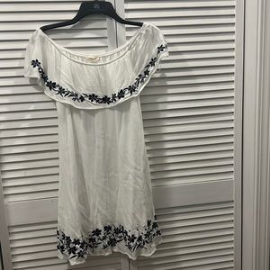 White off the shoulder dress with black flowers